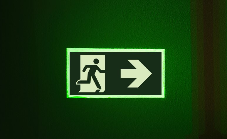 Photoluminescent exit signs